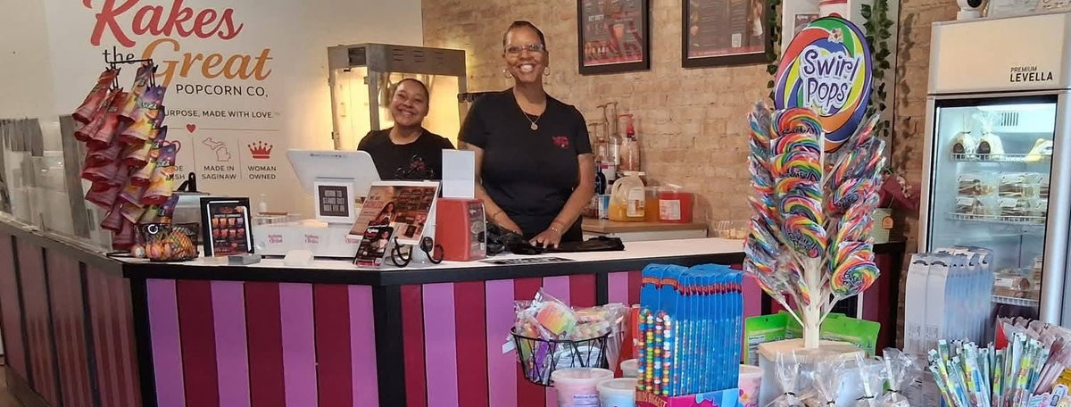 Alesha and Kaylynn standing behind the counter at their new brick and mortar location in Old Town Saginaw. 
